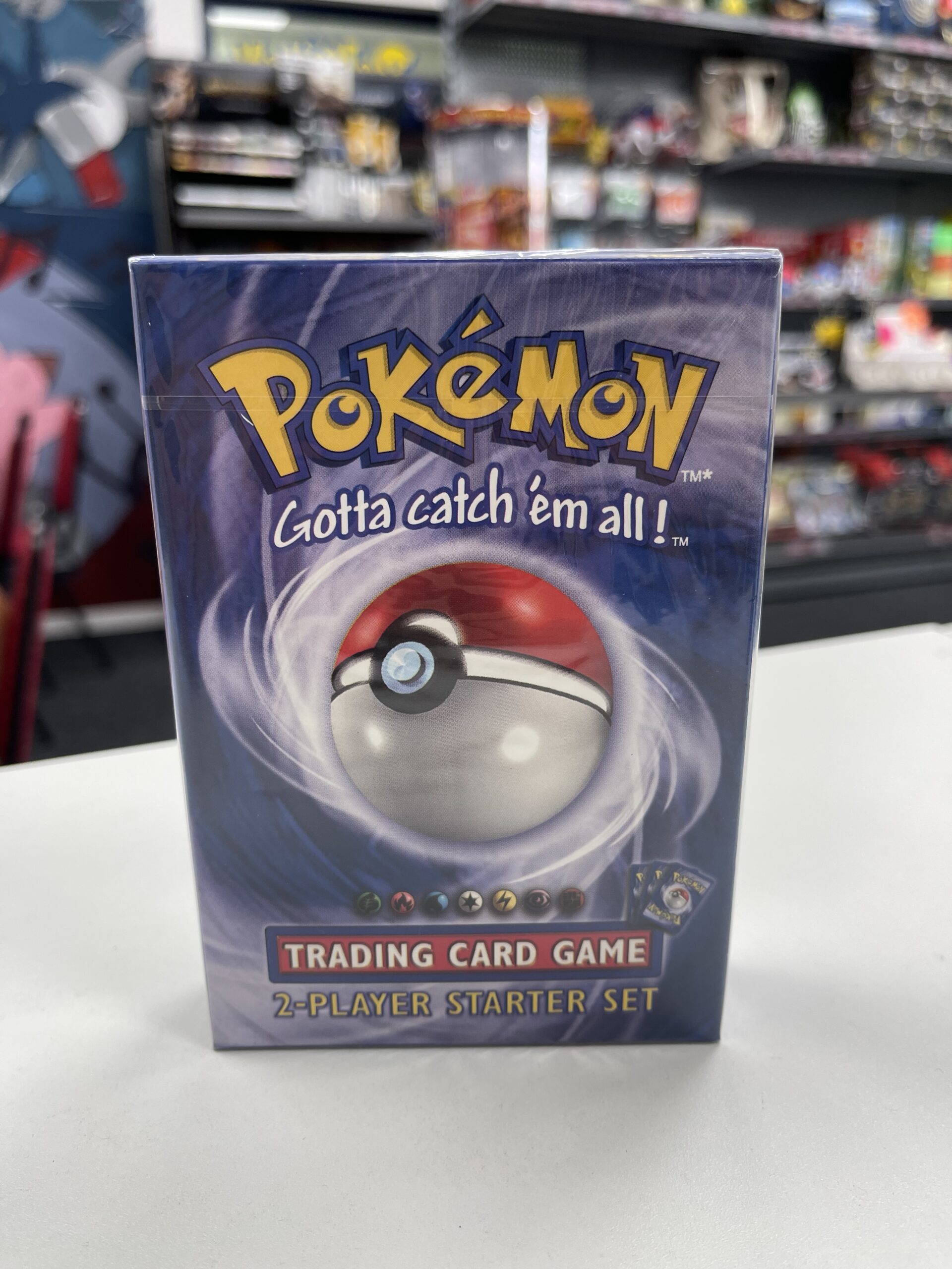 Sealed Pokémon TCG 2-Player Starter Deck from 1999, showing the Wizards of the Coast cellophane wrap.