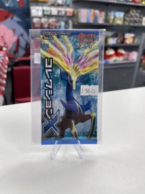 A sealed vintage Japanese booster pack from the Pokémon TCG set Collection X, featuring Xerneas artwork.