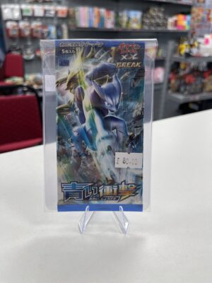 A sealed vintage Japanese booster pack from the Pokémon TCG set Blue Shock, featuring Mega Mewtwo Y artwork.