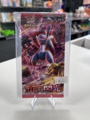 A sealed vintage Japanese booster pack from the Pokémon TCG set Red Flash, featuring Mega Mewtwo X artwork.